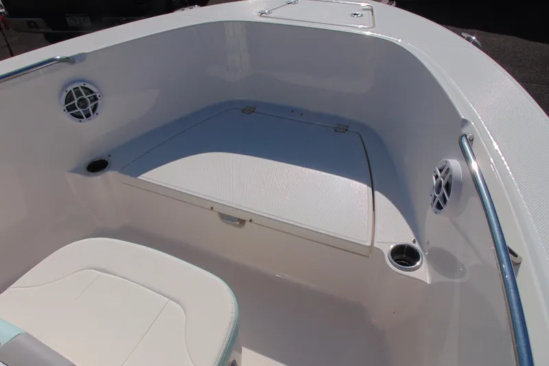 Slide: The Image of 2025 Robalo R180 Center Console boat interior with seating and storage. - 14