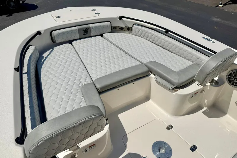Slide: The Image of 2026 Carolina Skiff 22 Ultra Elite boat with luxurious seating and modern design. - 10