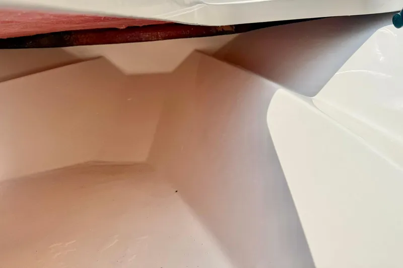 Slide: The Image of Interior view of 2026 Carolina Skiff 22 Ultra Elite boat, showcasing sleek design details. - 16