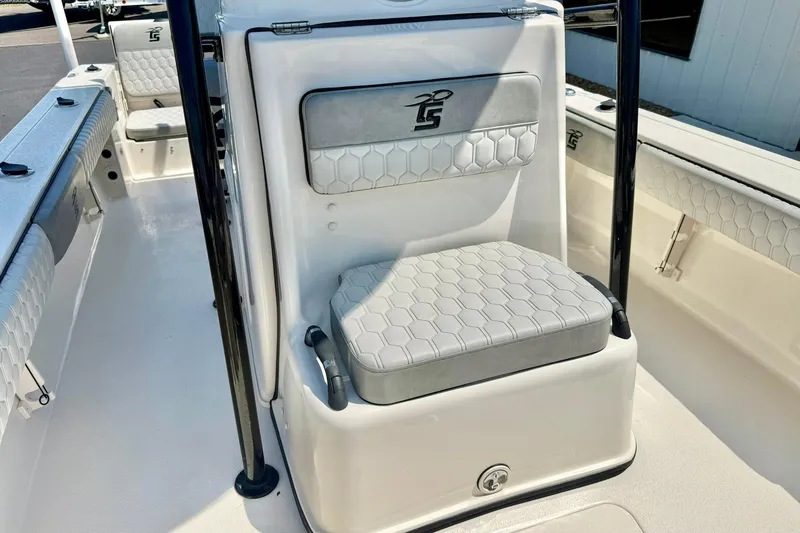 Slide: The Image of 2026 Carolina Skiff 22 Ultra Elite boat interior with cushioned seating and sleek design. - 20