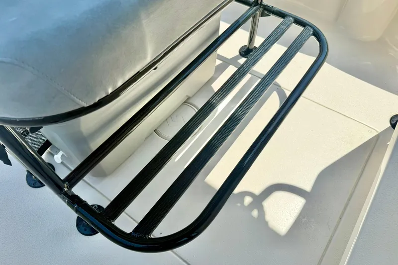 Slide: The Image of 2026 Carolina Skiff 22 Ultra Elite boat seat and footrest detail. - 24