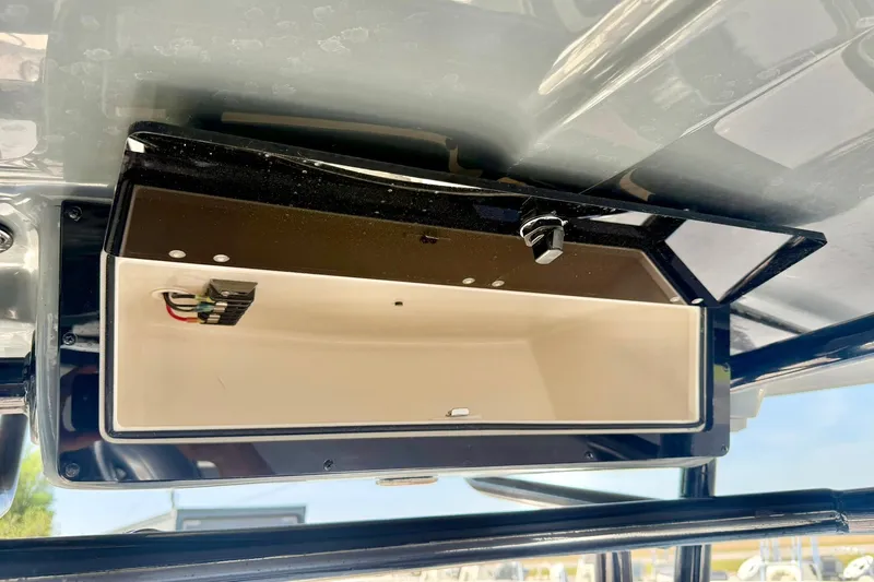 Slide: The Image of Open storage compartment on 2026 Carolina Skiff 22 Ultra Elite boat. - 27