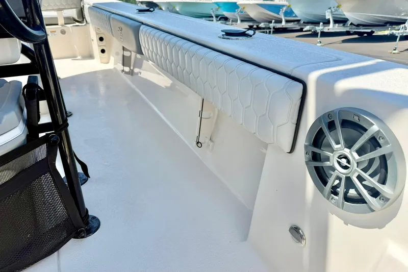 Slide: The Image of 2026 Carolina Skiff 22 Ultra Elite boat interior with seating and speaker detail. - 35