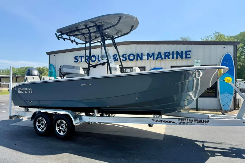 Slide: The Image of 2026 Carolina Skiff 22 Ultra Elite boat on trailer at Stroud & Son Marine. - 6