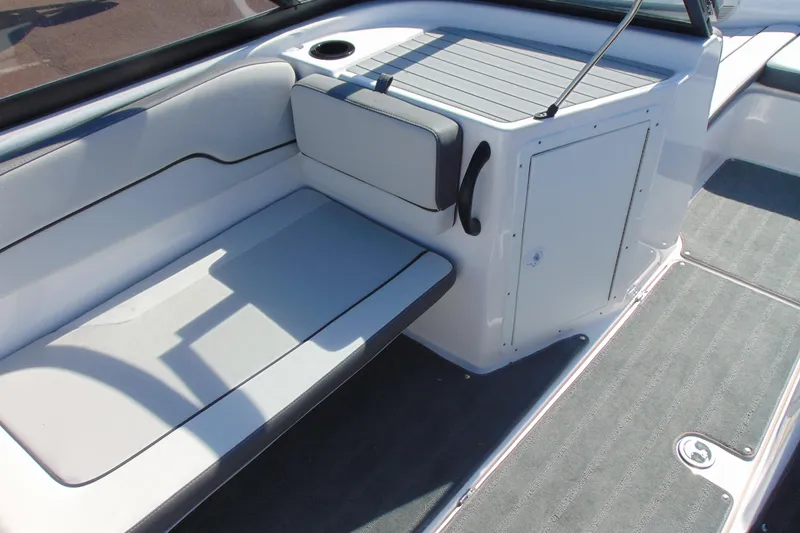 Slide: The Image of 2024 Yamaha Boats AR190 interior seating and storage area, featuring sleek design and comfortable upholstery. - 10
