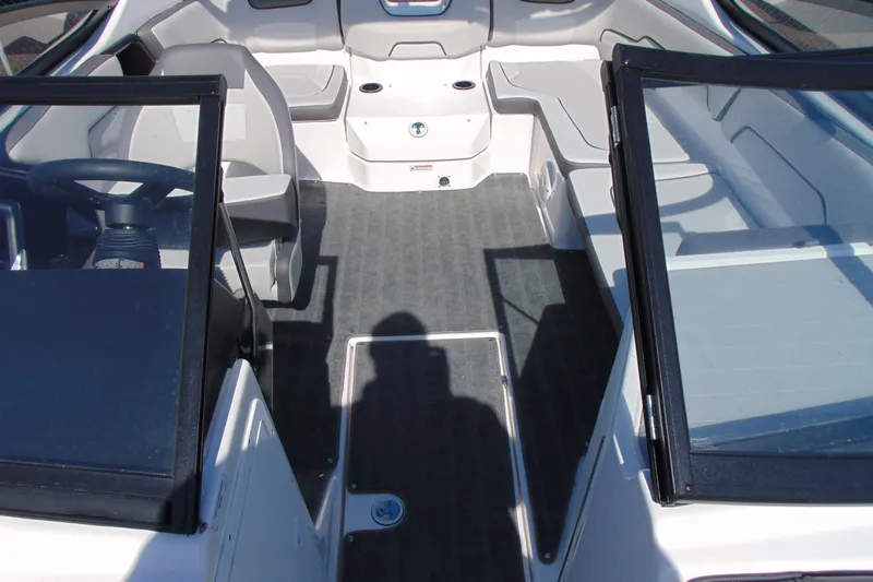 Slide: The Image of 2024 Yamaha Boats AR190 interior with seating and steering wheel. - 12