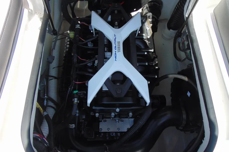 Slide: The Image of 2024 Yamaha AR190 boat engine compartment showcasing high-output engine components. - 13