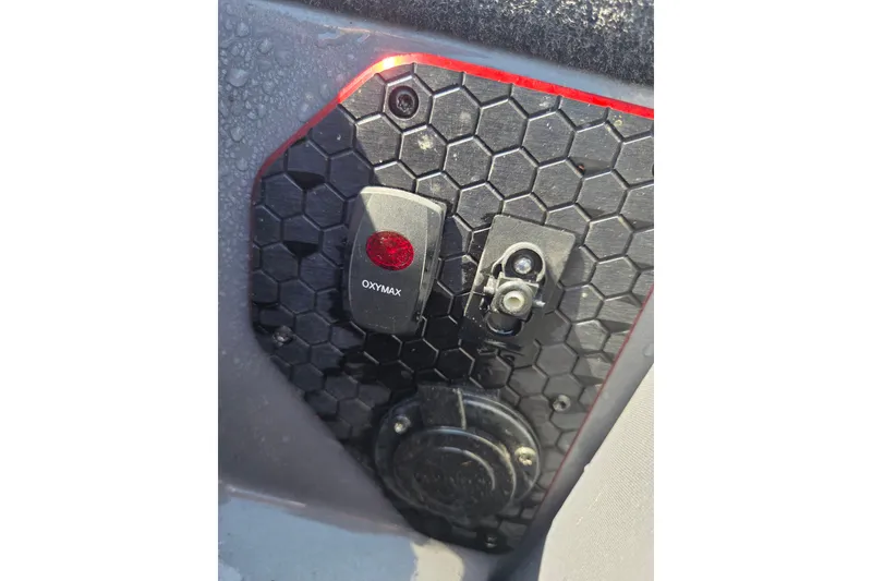 Slide: The Image of Control panel of a 2019 Skeeter FX21 Apex boat with Oxymax switch. - 11