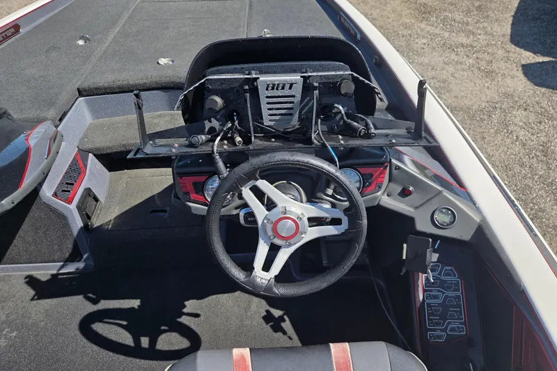 Slide: The Image of 2019 Skeeter FX21 Apex boat cockpit with steering wheel and control panel. - 17