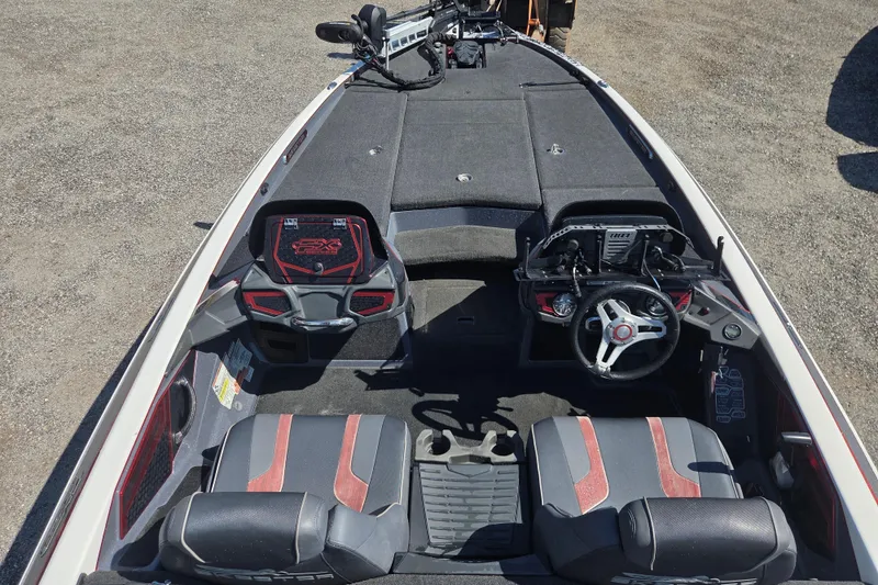 Slide: The Image of 2019 Skeeter FX21 Apex boat interior with dual seats and steering console. - 25