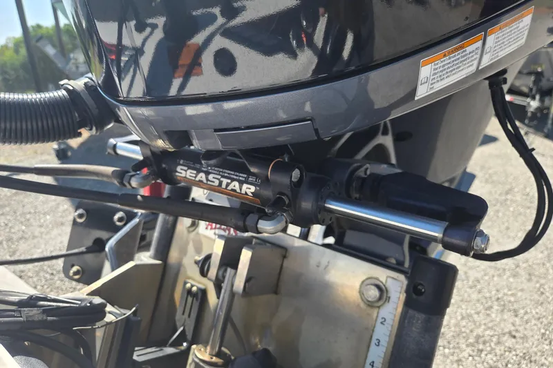 Slide: The Image of Close-up of 2019 Skeeter FX21 Apex boat's SeaStar hydraulic steering system. - 27