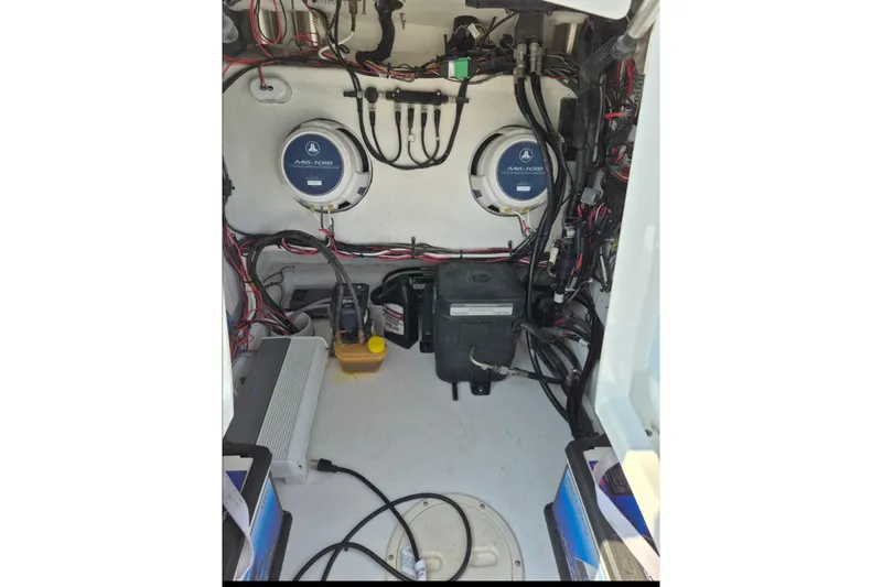 Slide: The Image of Interior view of 2023 Turner Boatworks 2500VS, showcasing wiring and components. - 11
