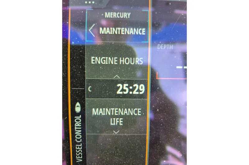 Slide: The Image of Display screen showing engine hours and maintenance for 2023 Turner Boatworks 2500VS. - 15