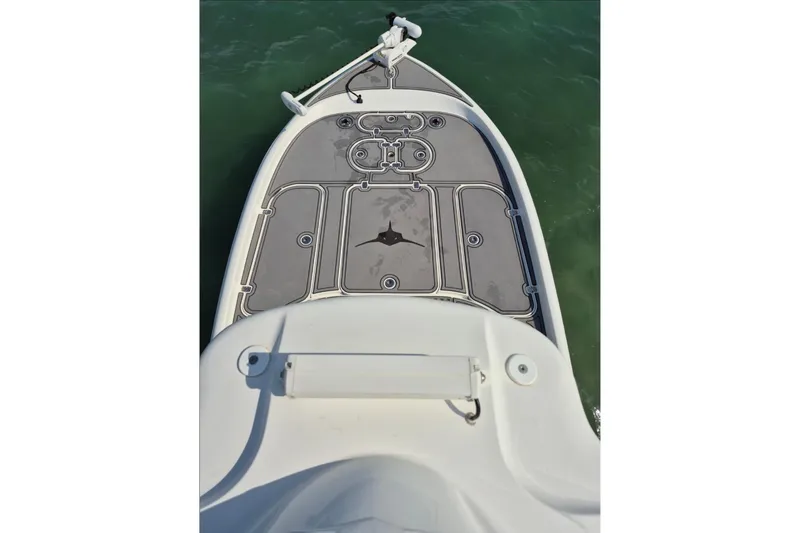 Slide: The Image of 2023 Turner Boatworks 2500VS bow deck, featuring sleek design and modern fittings on water. - 5