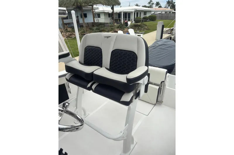 Slide: The Image of 2025 Tidewater 210 CC Adventure boat seating with modern design and comfort features. - 6