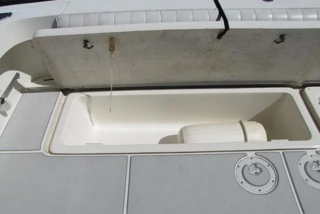 Slide: The Image of Built-in cooler on a 1997 Sea Ray 370 Express Cruiser boat deck. - 12