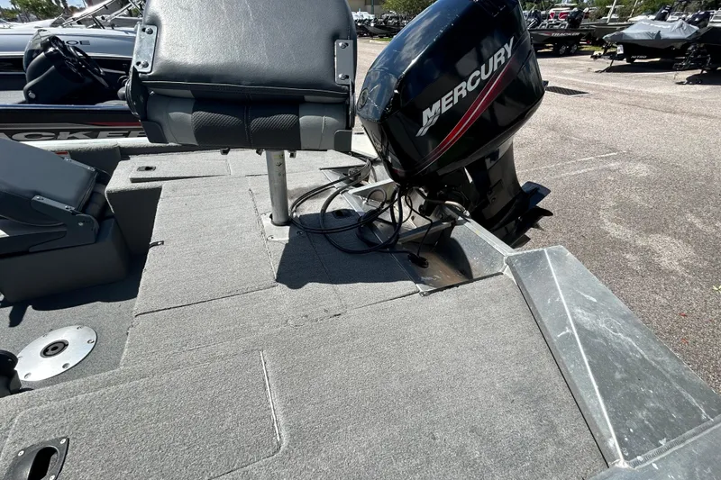 Slide: The Image of 2010 Tracker Pro Crappie 175 boat with Mercury outboard motor, gray interior. - 9