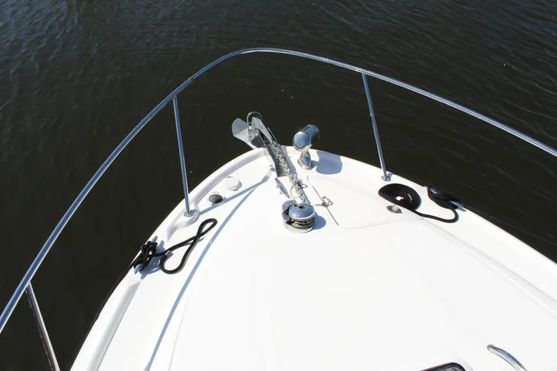 Slide: The Image of Interior view of a 2005 Sea Ray Sundancer 320 boat cockpit area. - 8
