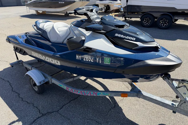 Slide: The Image of 2023 Sea-Doo GTX Limited 300 on trailer, parked outdoors. - 8