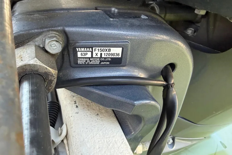 Slide: The Image of Close-up of Yamaha F150XB motor on 1998 Rosborough RF-246 Sedan Cruiser. - 14