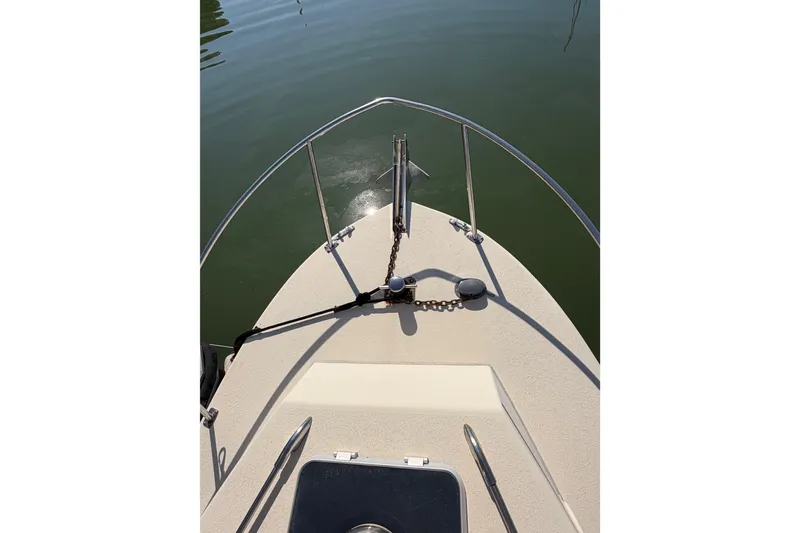 Slide: The Image of Bow view of 1998 Rosborough RF-246 Sedan Cruiser on calm water. - 17