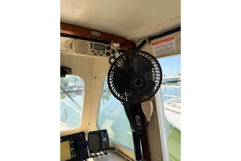 Slide: The Image of Interior of 1998 Rosborough RF-246 Sedan Cruiser with fan and radio equipment. - 40