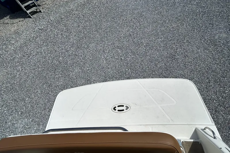 Slide: The Image of 2016 Sea Ray Sundancer 260 swim platform on gravel surface. - 17