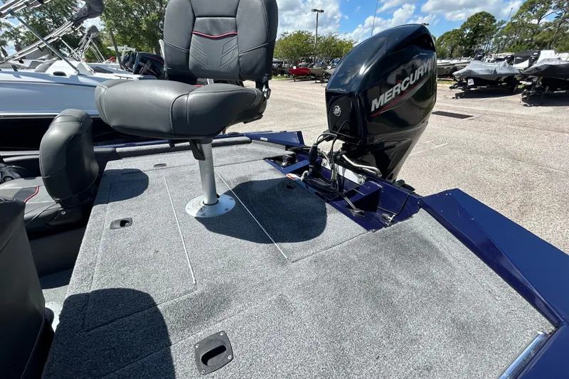 Slide: The Image of 2021 Tracker Pro Team 175 TF boat with Mercury outboard motor and seating. - 10