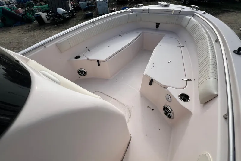 Slide: The Image of 2014 Grady-White Fisherman 230 boat interior with seating and storage compartments. - 5