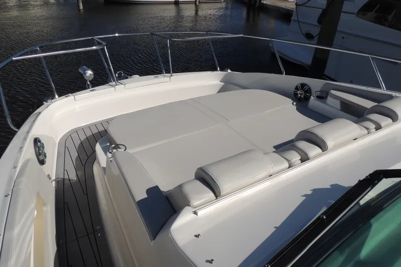 Slide: The Image of 2020 Sea Ray Sundancer 320 Outboard boat with spacious sun deck and sleek design. - 10