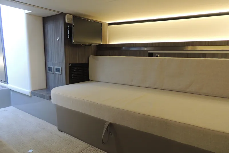 Slide: The Image of Interior of 2020 Sea Ray Sundancer 320 Outboard with beige seating and modern design. - 13