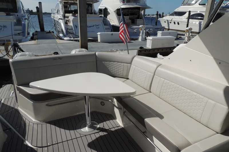 Slide: The Image of Luxury seating area on 2020 Sea Ray Sundancer 320 Outboard yacht at marina. - 3