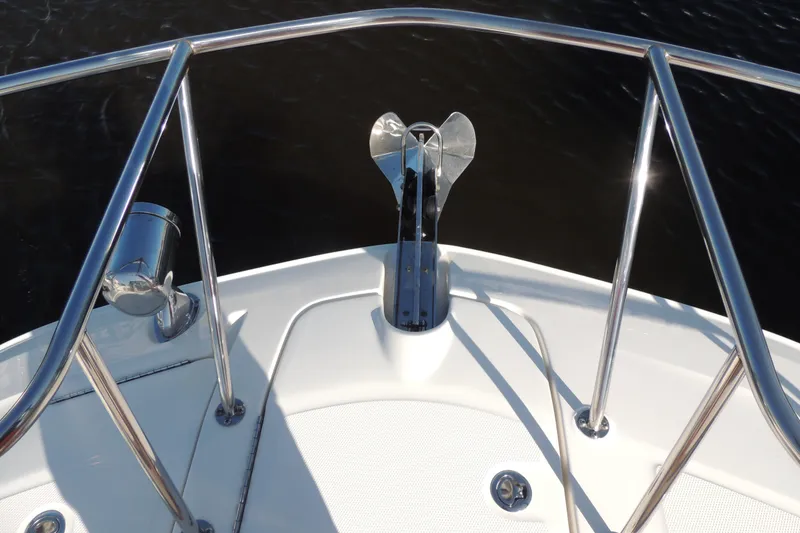 Slide: The Image of Bow of 2020 Sea Ray Sundancer 320 Outboard with anchor and railing. - 8