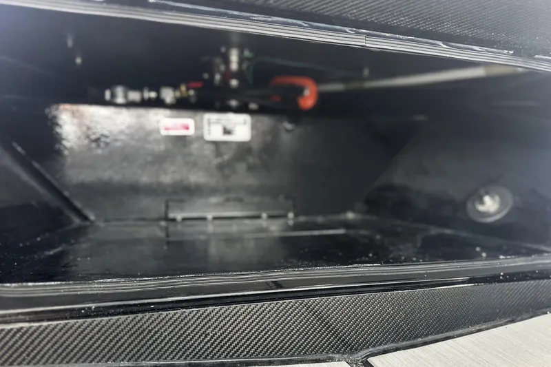 Slide: The Image of Interior view of 2026 Chittum Skiffs 18 Challenger 2.0 storage compartment. - 15