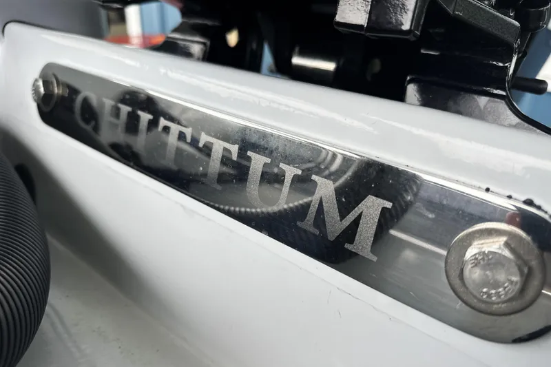 Slide: The Image of Close-up of Chittum Skiffs 18 Challenger 2.0, 2026 model, showcasing brand nameplate. - 16