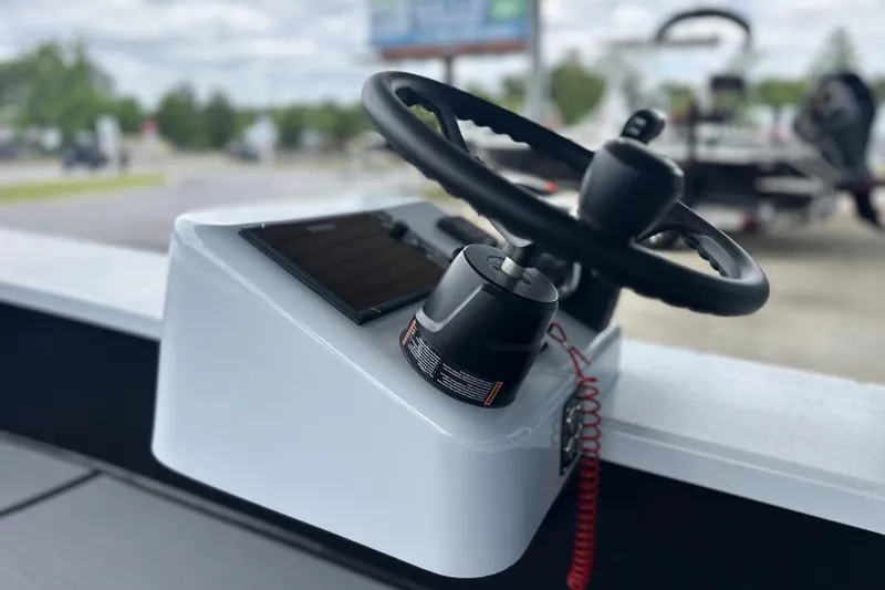 Slide: The Image of Steering console of 2026 Chittum Skiffs 18 Challenger 2.0 boat, featuring modern design. - 20