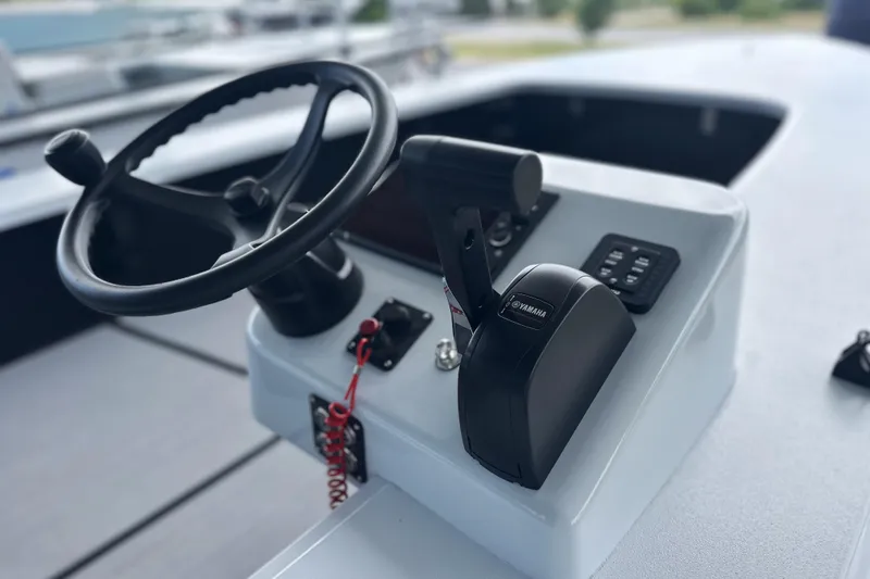 Slide: The Image of Steering console of 2026 Chittum Skiffs 18 Challenger 2.0 with Yamaha controls. - 21