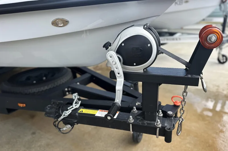 Slide: The Image of Trailer hitch of 2026 Chittum Skiffs 18 Challenger 2.0 with winch and chain. - 25
