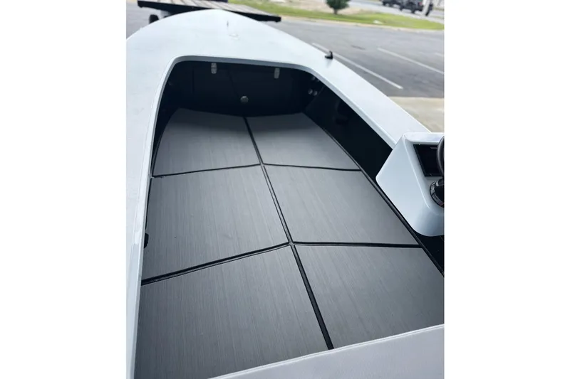 Slide: The Image of Interior view of 2026 Chittum Skiffs 18 Challenger 2.0 boat, showcasing sleek deck design. - 3