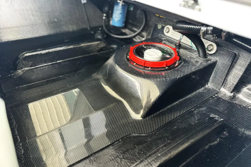 Slide: The Image of 2026 Chittum Skiffs 18 Challenger 2.0 interior with carbon fiber detailing. - 8