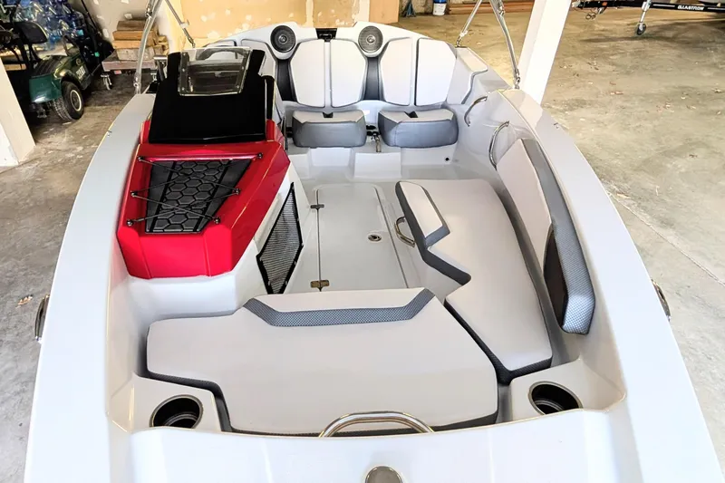 Slide: The Image of 2023 Scarab 165 ID boat interior with modern seating and storage features. - 3