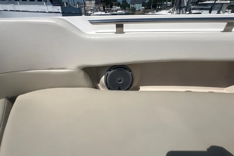 Slide: The Image of Interior view of a 2015 Boston Whaler 320 Vantage boat with speaker detail. - 18