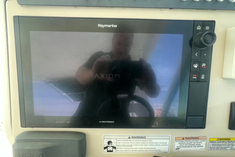 Slide: The Image of Raymarine Axiom display on 2015 Boston Whaler 320 Vantage boat dashboard. - 36