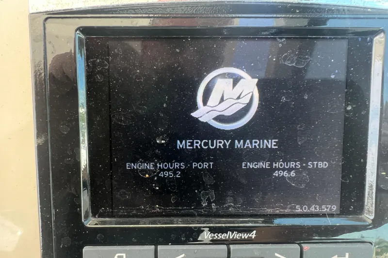 Slide: The Image of Mercury Marine display showing engine hours on a 2015 Boston Whaler 320 Vantage. - 37