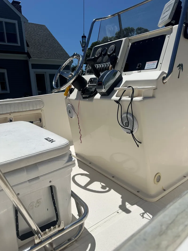 Slide: The Image of Interior view of a 2005 Key West 19 cc boat with helm console. - 3