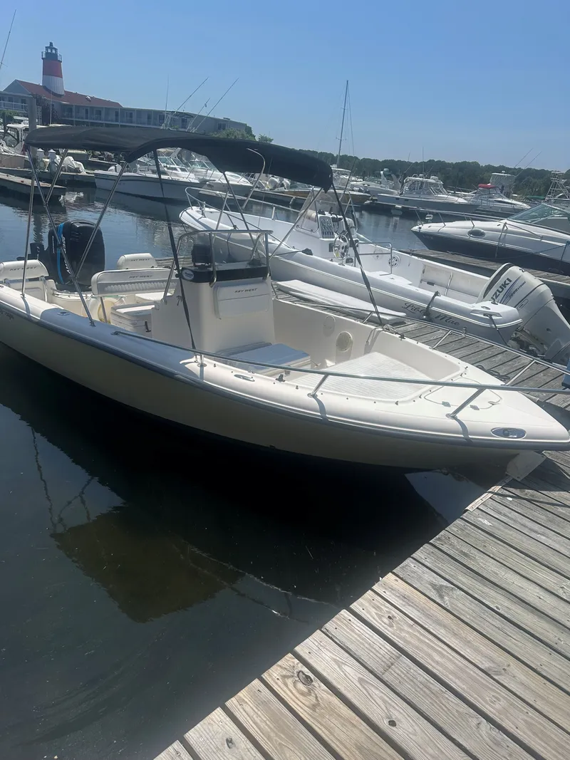 Slide: The Image of 2005 Key West 19 cc boat docked at marina. - 5
