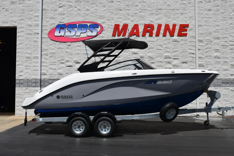 The Image of 2026 Yamaha Boats AR220 on trailer at GSPS Marine dealership. - 1