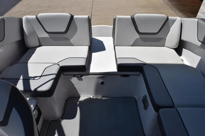 Slide: The Image of 2026 Yamaha Boats AR220 interior seating with modern gray upholstery. - 11