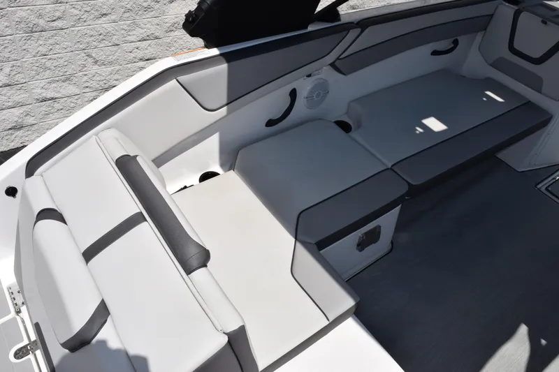 Slide: The Image of 2026 Yamaha Boats AR220 interior seating with sleek, modern design and comfortable upholstery. - 9