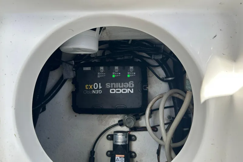 Slide: The Image of Propeller of a 2016 Sea Hunt Ultra 211 boat on a trailer. - 12